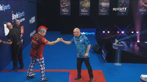 Peter Wright besiegelt beim Grand Slam of Darts das frühe Ende von Ian White. Der Weltmeister siegt mit 5:3. 