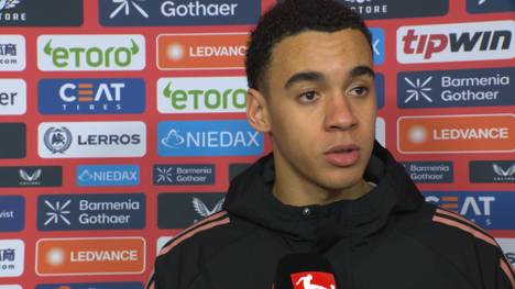 Die Vertragsverlängerung von Jamal Musiala verkündete der FC Bayern mit einem spektakulären Video - er selbst scherzt deswegen über die Bekanntgabe der Verlängerung von Davies.