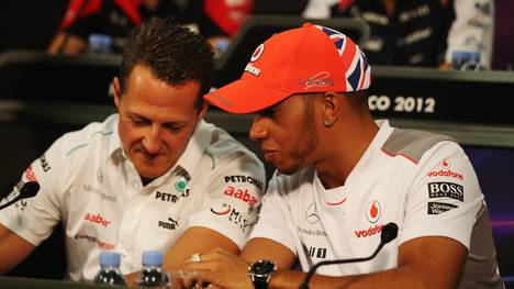 Michael Schumacher (l.) und Lewis Hamilton im Jahr 2012