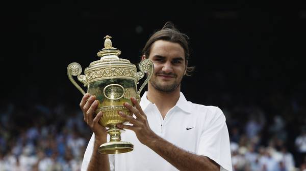 Roger Federer of Switzerland holds the trophy