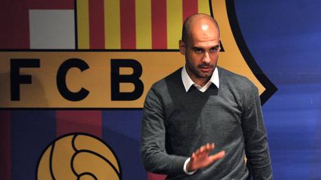 Barcelona's coach Josep Guardiola gives 
