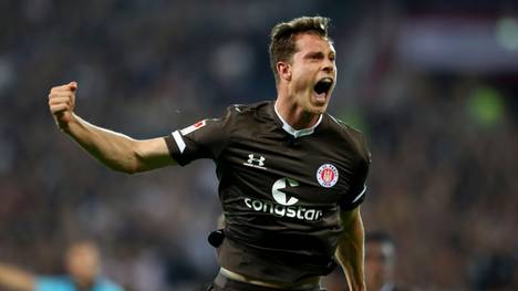 HAMBURG, GERMANY - AUGUST 26: James Lawrence of St. Pauli celebrates after he scores the opening goal during the Second Bundesliga match between FC St. Pauli and Holstein Kiel at Millerntor Stadium on August 26, 2019 in Hamburg, Germany. (Photo by Martin Rose/Bongarts/Getty Images)