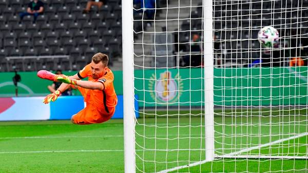 Leverkusen's Finnish goalkeeper Lukas Hradecky concedes the opening goal during the German Cup (DFB Pokal) final football match Bayer 04 Leverkusen v FC Bayern Munich at the Olympic Stadium in Berlin on July 4, 2020. (Photo by John MACDOUGALL / various sources / AFP) / DFB REGULATIONS PROHIBIT ANY USE OF PHOTOGRAPHS AS IMAGE SEQUENCES AND QUASI-VIDEO. (Photo by JOHN MACDOUGALL/POOL/AFP via Getty Images)