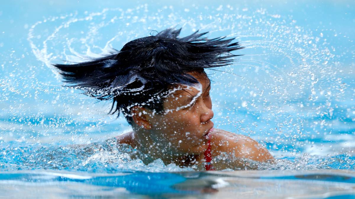 Der Sprung sitzt, die Frisur ist dahin: Turmspringer Woo Ha-ram aus Korea beim Auftauchen