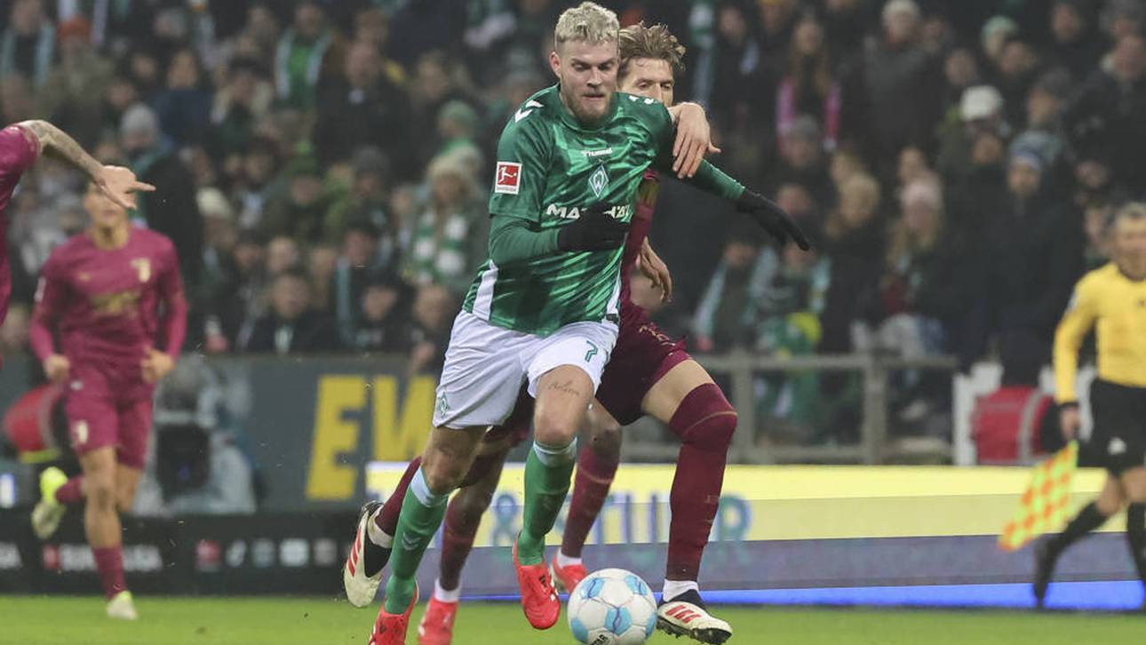 Marvin Ducksch (in grün) im Duell mit Kristijan Jakic 