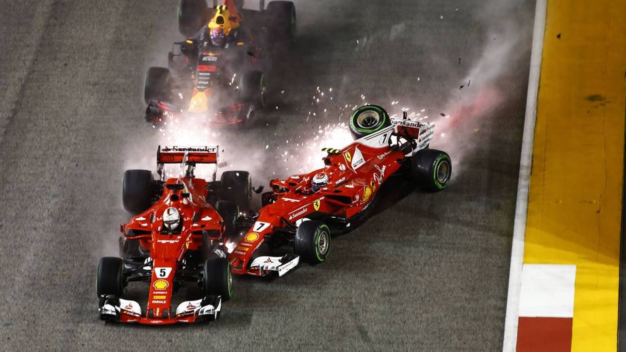Die Ferraris Räikkönnen (rechts) und Vettel nehmen sich gegenseitig aus dem Verkehr