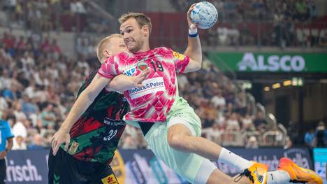 Die Füchse Berlin setzen sich gegen den SC Magdeburg in einem hart umkämpften Duell im DHB-Supercup durch