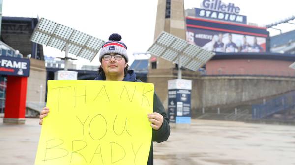 FOXBOROUGH, MASSACHUSETTS - MARCH 17: Patriot fan Kosta Agganis, 19, of Saugus, MA, stands with a sign thanking former New England Patriots quarterback Tom Brady outside of Gillette Stadium on March 17, 2020 in Foxborough, Massachusetts. Brady announced he will leave the Patriots after 20 years with the team to enter free agency. ( (Photo by Maddie Meyer/Getty Images)
