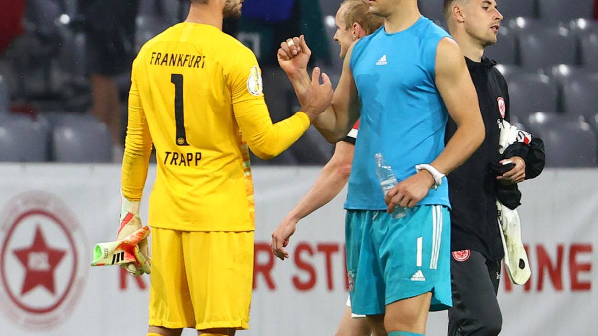 MUNICH, GERMANY - JUNE 10: Kevin Trapp of Eintracht Frankfurt and Manuel Neuer of Bayern Munich after the match during the DFB Cup semifinal match between FC Bayern Muenchen and Eintracht Frankfurt at Allianz Arena on June 10, 2020 in Munich, Germany. (Photo by Kai Pfaffenbach/Pool via Getty Images)