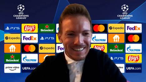 Auf der Pressekonferenz zum Champions League Spiel des FC Bayern gegen Benfica Lissabon spricht Julian Nagelsmann über seine Coronainfektion und witzelt über das mögliche Sprüchefeuerwerk seines Trainerteams.