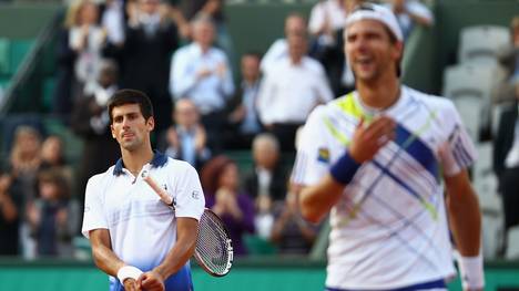 Nach der Niederlage gegen Jürgen Melzer (r.) dachte Novak Djokovic (l.) über einen Rücktritt nach