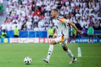Florian Wirtz rettet die deutsche Nationalmannschaft im EM-Viertelfinale gegen Spanien zwar in der Schlussphase, doch vor dem Wiederanpfiff zur Verlängerung gibt es Pfiffe. Grund dafür ist die Einwechslung eines DFB-Stars.