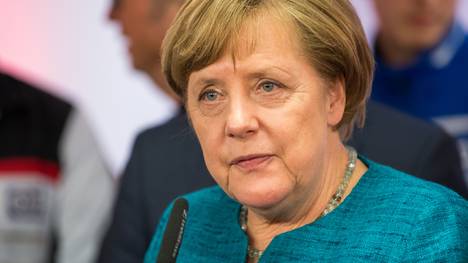 Angela Merkel Visits 1. FC Koeln Foundation