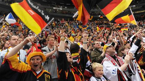 Germany's fans cheer during the IIHF Ice