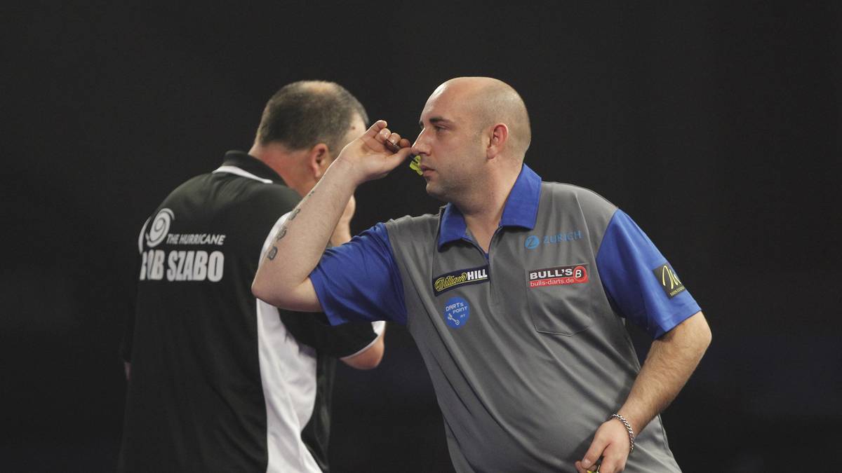 Für Suljovics Landsmann Michael Rasztovits (r.) ist das Turnier dagegen bereits beendet. In der Vorrunde ist gegen den Neuseeländer Rob Szabo kein Kraut gewachsen.