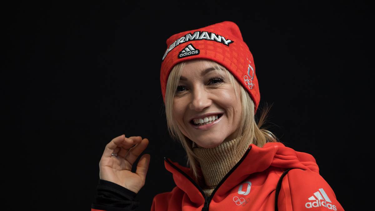 Ein Olympia-Traum in orange: Die gebürtige Ukrainerin Savchenko macht im deutschen Outfit eine glänzende Figur