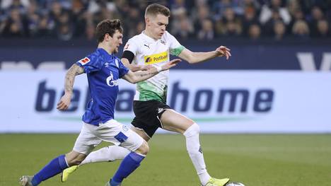 Matthias Ginter (r.) will mit Gladbach gegen Schalke punkten