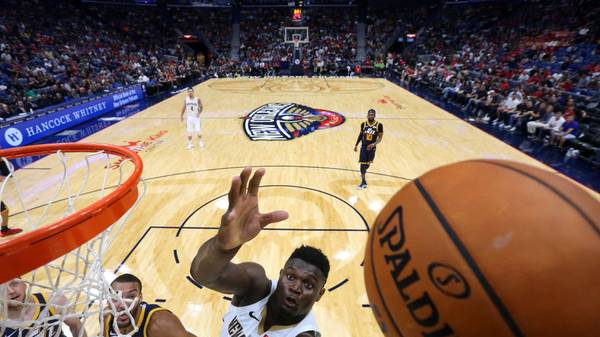 NEW ORLEANS, LOUISIANA - OCTOBER 11: Zion Williamson #1 of the New Orleans Pelicans shoots against Rudy Gobert #27 of the Utah Jazz during the second half of a game at the Smoothie King Center on October 11, 2019 in New Orleans, Louisiana. (Photo by Jonathan Bachman/Getty Images)