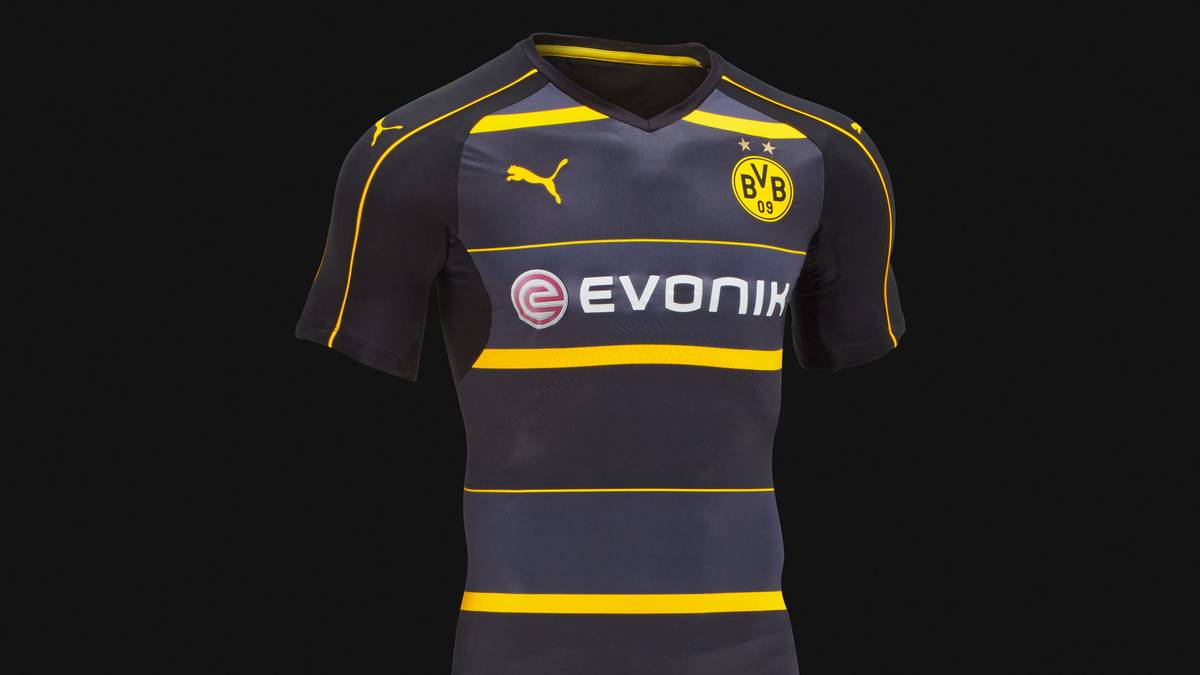  Die Ärmel ziert ein schwarzer Formstreifen, der durch gelbe Streifen hervorgehoben wird