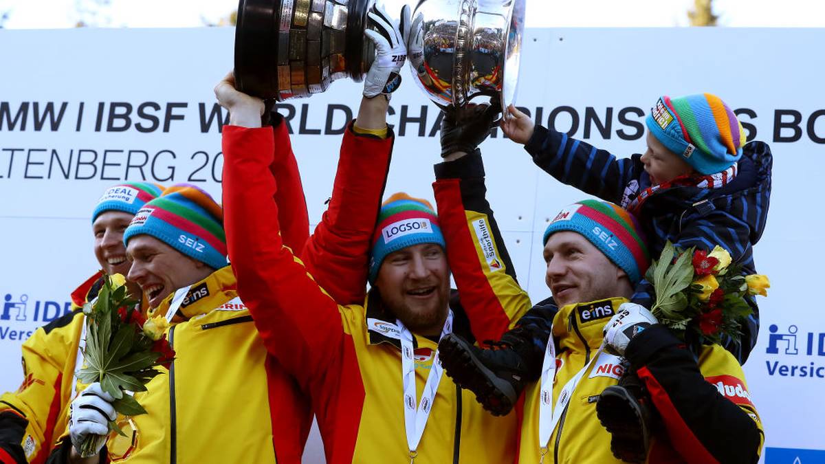 Francesco Friedrich, Candy Bauer, Martin Grothkopp und Alexander Schueller feierten ihre Goldmedaille
