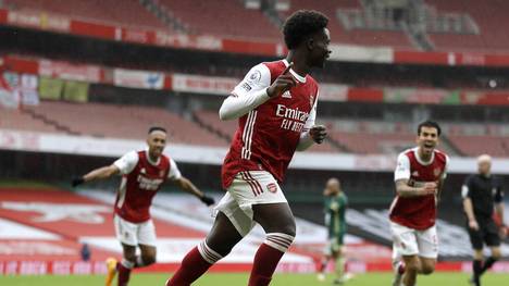Arsenal v Sheffield United - Premier League - Emirates Stadium Arsenal s Bukayo Saka celebrates scoring his side s first goal of the game during the Premier League match at The Emirates Stadium, London. EDITORIAL USE ONLY No use with unauthorised audio, video, data, fixture lists, club league logos or live services. Online in-match use limited to 120 images, no video emulation. No use in betting, games or single club league player publications. PUBLICATIONxINxGERxSUIxAUTxONLY Copyright: xKirstyxWigglesworthx 55869705