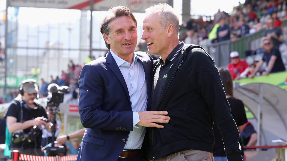 Gute Laune im Breisgau trotz angespannter sportlicher Situation: Wolfsburgs Bruno Labbadia (l.) scherzt mit dem Freiburger Trainer-Kollegen Christian Streich