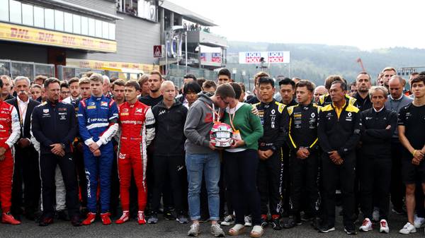 SPA, BELGIUM - SEPTEMBER 01: The mother and brother of the late Formula 2 driver Anthoine Hubert stand for a minutes silence on the Formula 3 grid before the F1 Grand Prix of Belgium at Circuit de Spa-Francorchamps on September 01, 2019 in Spa, Belgium. (Photo by Mark Thompson/Getty Images)