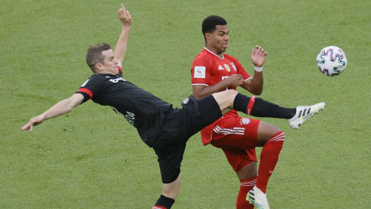 Leverkusen's German defender Sven Bender (L) and Bayern Munich's German midfielder Serge Gnabry vie for the ball during the German Cup (DFB Pokal) final football match Bayer 04 Leverkusen v FC Bayern Munich at the Olympic Stadium in Berlin on July 4, 2020. (Photo by Ronald WITTEK / POOL / AFP) / DFB REGULATIONS PROHIBIT ANY USE OF PHOTOGRAPHS AS IMAGE SEQUENCES AND QUASI-VIDEO. (Photo by RONALD WITTEK/POOL/AFP via Getty Images)