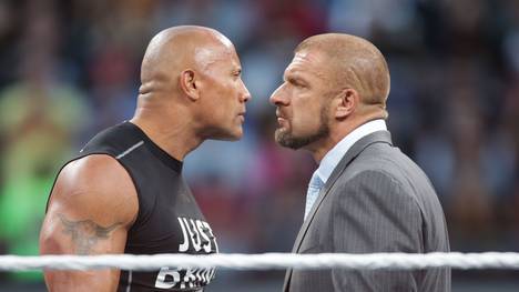 Langjährige Rivalen im Wrestling-Ring der WWE: The Rock und Triple H