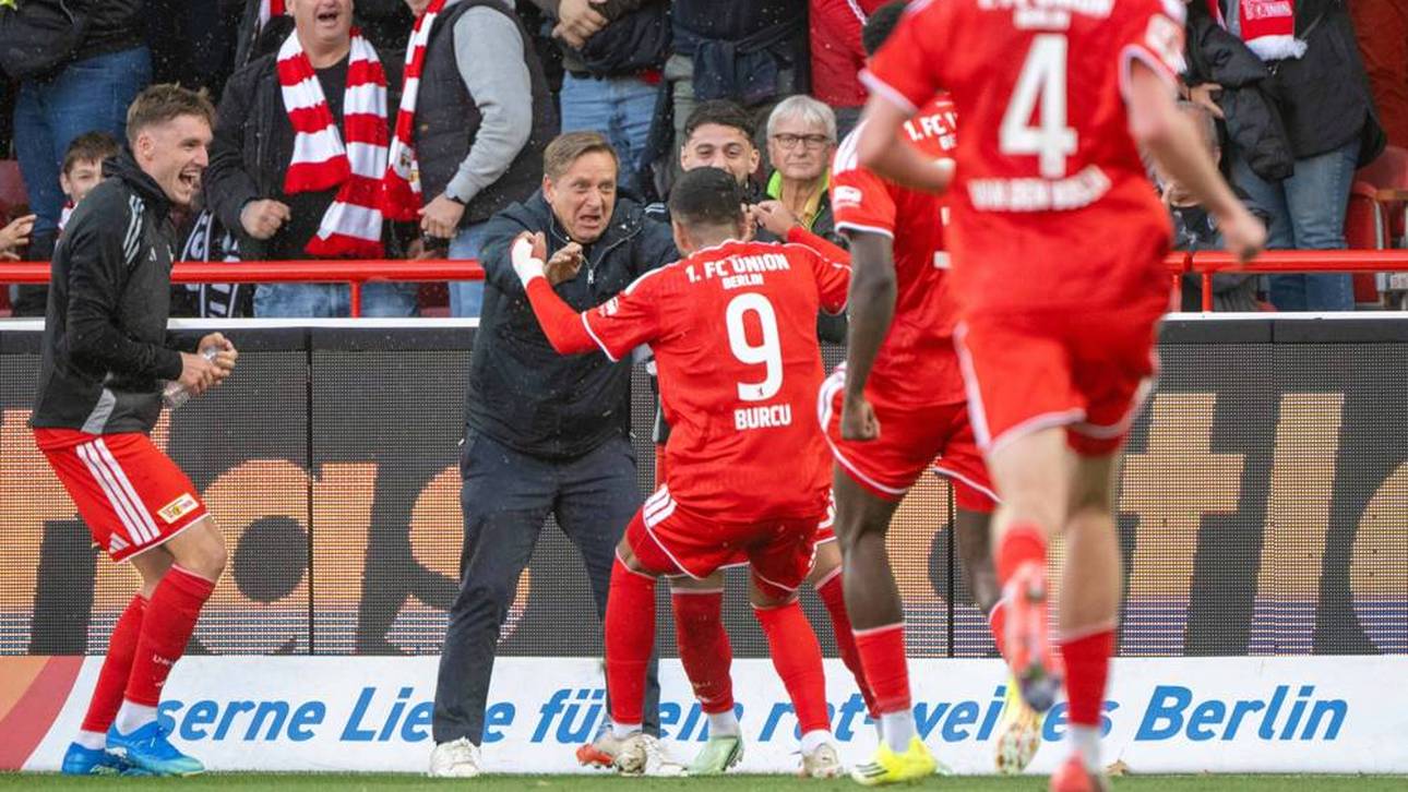 Livan Burcu jubelt mit Union-Geschäftsführer Horst Heldt 