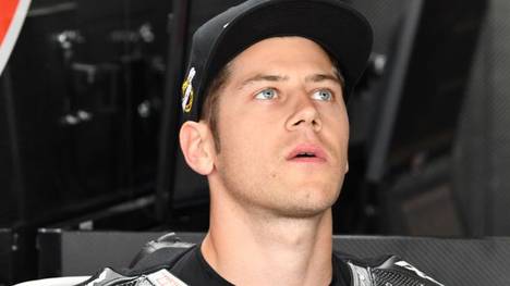 Dynavolt Intact's German rider Marcel Schrotter waits before the third free practice session of the Moto 2 Grand Prix of the Czech Republic in Brno on August 3, 2019. - Dynavolt Intact's Swiss rider Thomas Luthi waits before the third free practice session of the Moto 3 Grand Prix of the Czech Republic in Brno on August 3, 2019. (Photo by Michal CIZEK / AFP)        (Photo credit should read MICHAL CIZEK/AFP/Getty Images)