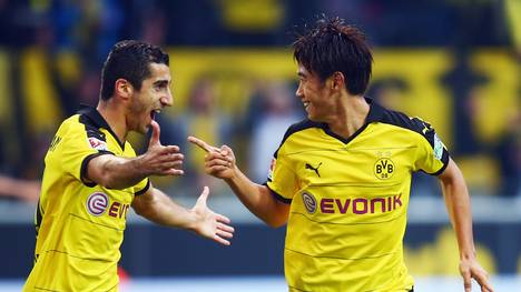 Shinji Kagawa (r.) und Henrikh Mkhitaryan stehen mit Borussia Dortmund an der Tabellenspitze