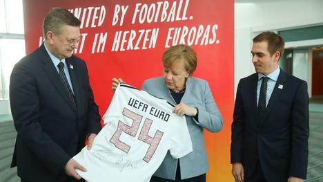 Reinhard Grindel And Philipp Lahm Visit German Chancellor Angela Merkel