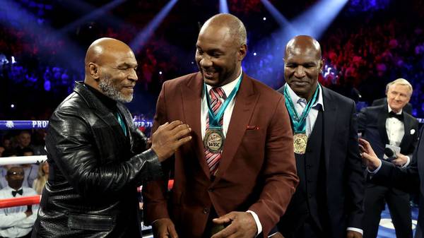 LAS VEGAS, NEVADA - FEBRUARY 22:  (L-R) Former Heavyweight Champions Mike Tyson, Lennox Lewis and Evander Holyfield are honored prior to the Heavyweight bout for Wilder's WBC and Fury's lineal heavyweight title between Tyson Fury and Deontay Wilder on February 22, 2020 at MGM Grand Garden Arena in Las Vegas, Nevada. (Photo by Al Bello/Getty Images)