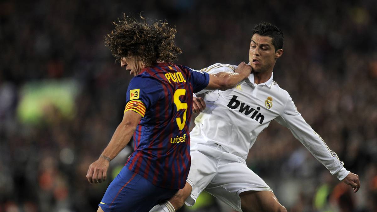 RONALDOS LEHRSTUNDE - 2012: Beide Rivalen besannen sich wieder aufs Sportliche, auf dem Rasen ging es dennoch heiß her. Real entschied in der Saison 2011/12 das Titelrennen - dank Ronaldo