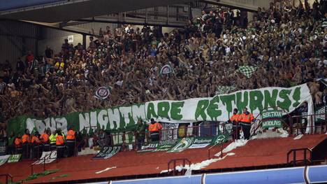 Rapid Vienna fans display banners during