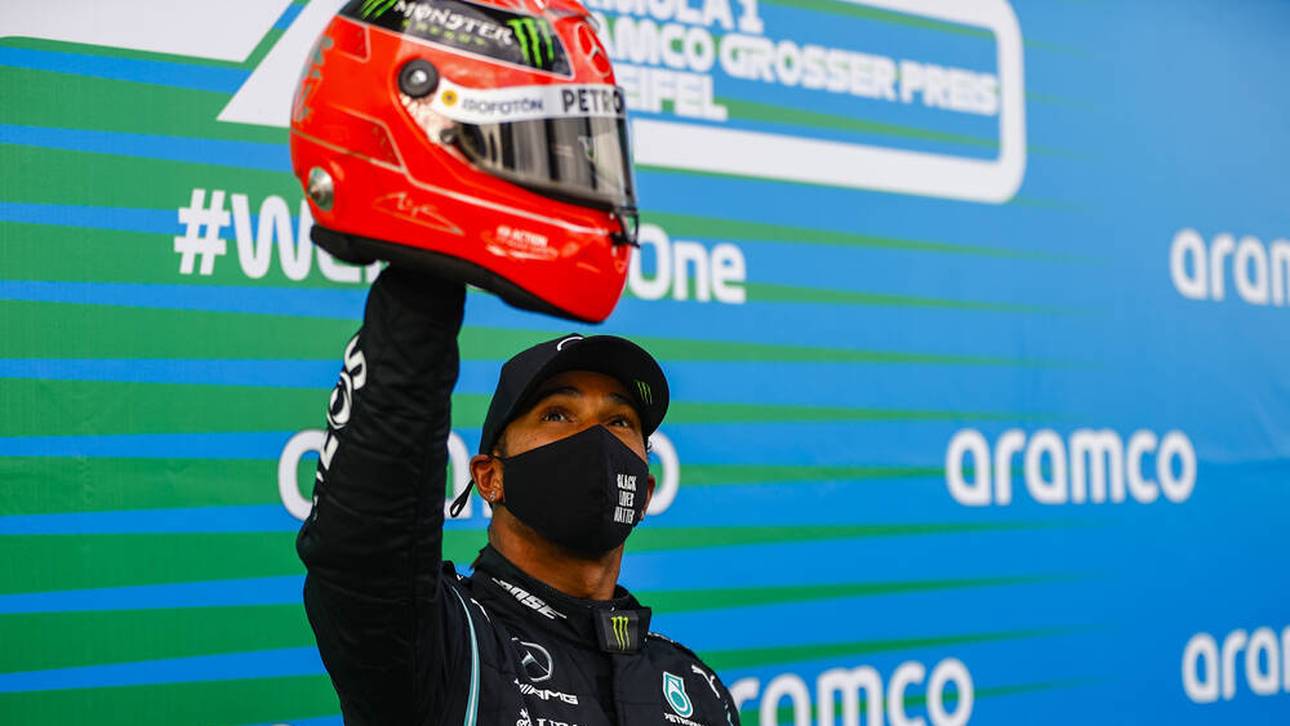 Formel 1 Rekorde: Lewis Hamilton mit dem Helm von Michael Schumacher nach seinem 91. Sieg.