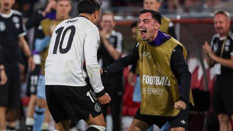 Nadiem Amiri erzielt im WM-Qualifikationsspiel gegen Nordirland nicht nur das wichtige 2:1, sondern auch sein erstes Länderspieltor. Hinterher erklärt er seinen Jubel.