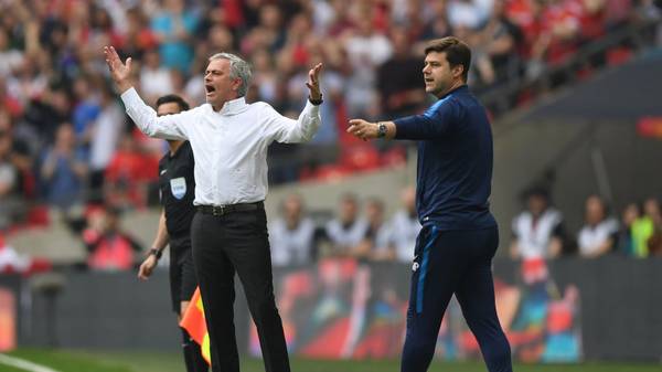 LONDON, ENGLAND - APRIL 21:  Jose Mourinho, Manager of Manchester United reacts as Mauricio Pochettino, Manager of Tottenham Hotspur gives his team instructions during The Emirates FA Cup Semi Final match between Manchester United and Tottenham Hotspur at Wembley Stadium on April 21, 2018 in London, England.  (Photo by Shaun Botterill/Getty Images)