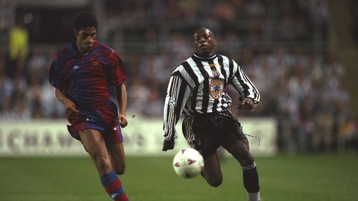 17 Sep 1997:  Michael Reiziger (left) of Barcelona takes on Faustino Asprilla (right) of Newcastle United during the Champions League match at St James'' Park in Newcastle-upon-Tyne, England. Newcastle United won the match 3-2.   \ Mandatory Credit: CliveBrunskill/Allsport