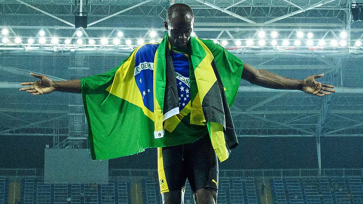 Als er endgültig in den Kreis der Sportlegenden aufgestiegen war, stellt sich Usain Bolt mit ausgebreiteten Armen wie die lebendig gewordene Christus-Statue in Rio vor die jubelnden Fans