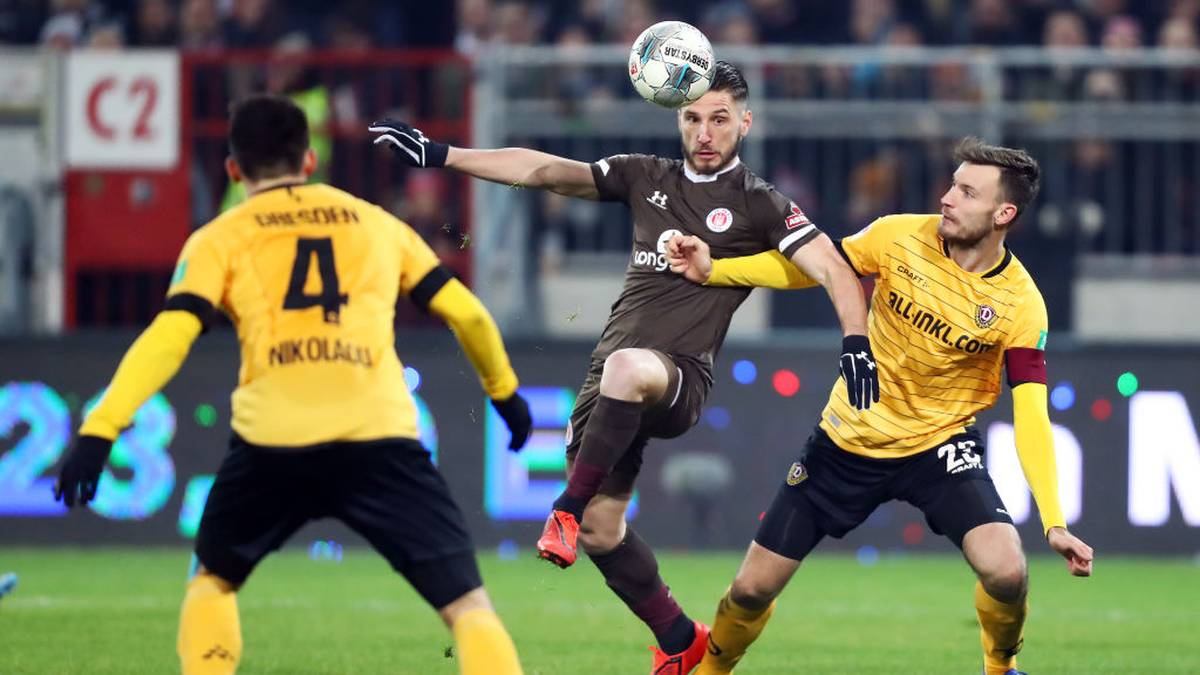 Kein Durchkommen. St. Paulis Dimitrios Diamantakos in Bedrängnis gegen Dynamo Dresden