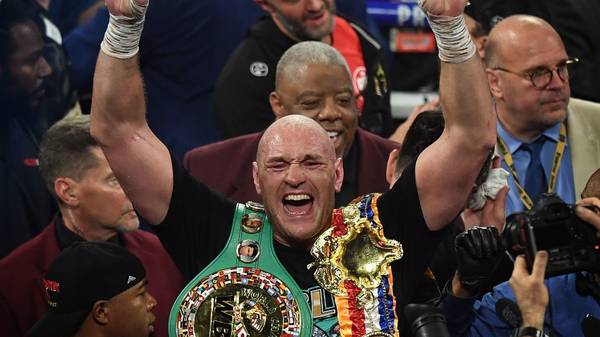 British boxer Tyson Fury celebrates after defeating US boxer Deontay Wilder in the seventh round during their World Boxing Council (WBC) Heavyweight Championship Title boxing match at the MGM Grand Garden Arena in Las Vegas on February 22, 2020. (Photo by Mark RALSTON / AFP) (Photo by MARK RALSTON/AFP via Getty Images)