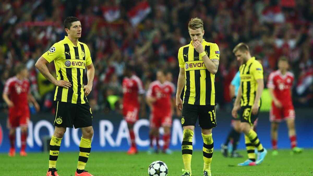 Doch im Wembley-Stadion platzt mal wieder ein Titeltraum. Reus und Robert Lewandowski sind nach einem späten Gegentor fassungslos