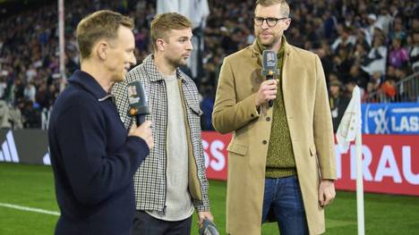 Per Mertesacker (r.) und Christoph Kramer (m.) sind für das ZDF unterwegs