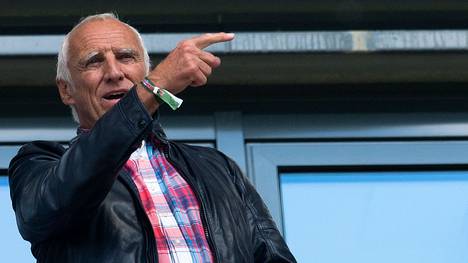 Red Bull's Austrian founder Dietrich Mateschitz gestures from the VIP stands prior tothe German second division Bundesliga football match between RB Leipzig and Karlsruher SC at the Red Bull Arena in Leipzig, eastern Germany, on May 8, 2016. / AFP / Robert MICHAEL        (Photo credit should read ROBERT MICHAEL/AFP via Getty Images)
