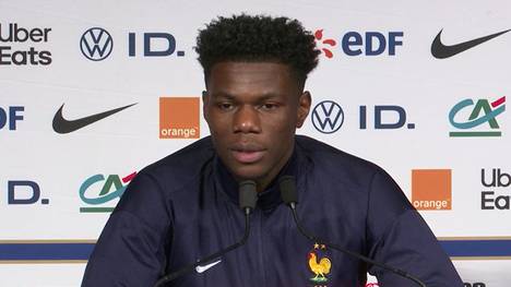 Frankreich-Coach Didier Deschamps und Real-Star Aurelien Tchouameni loben Michael Olise. Der Bayern-Profi überzeugt nicht nur in München, sondern auch bei der Equipe Tricolore.