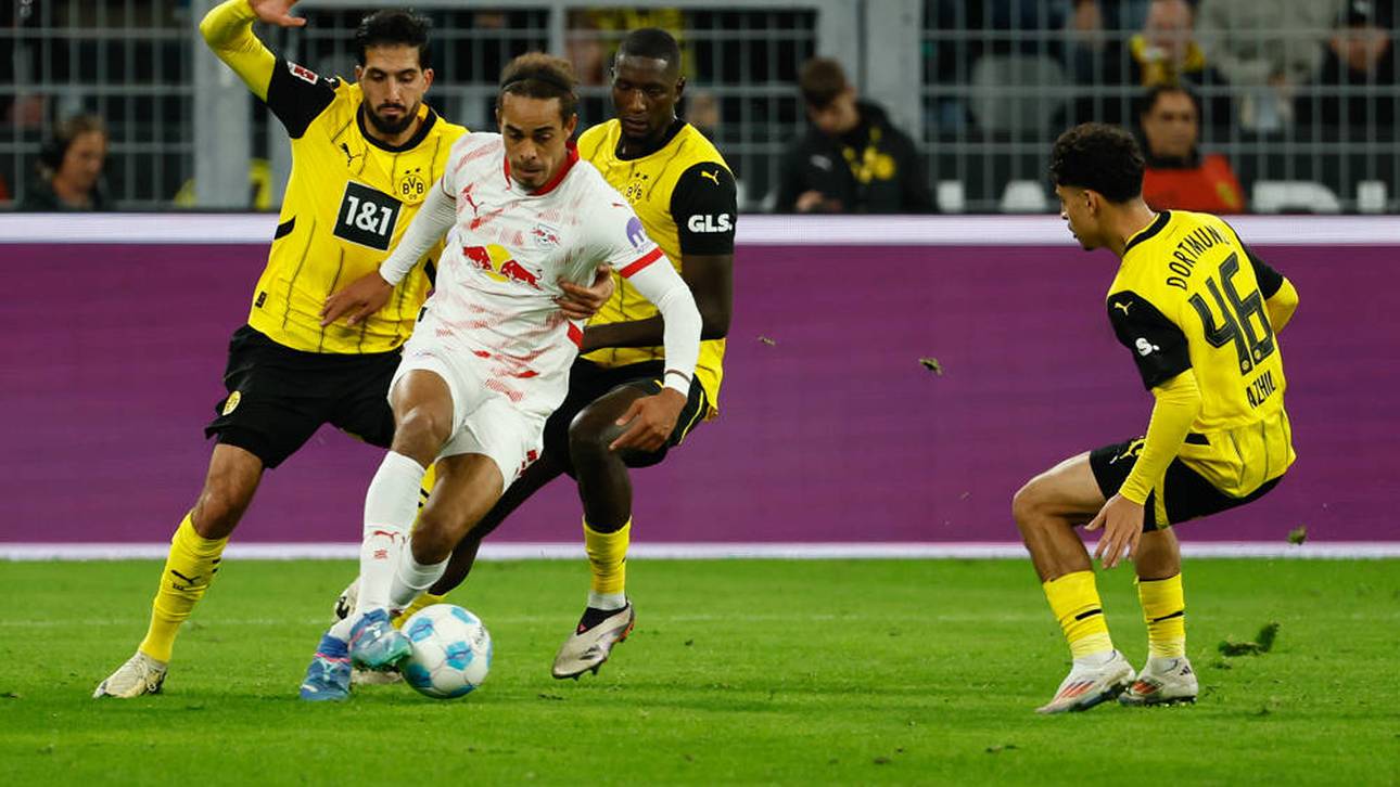 Guirassy wirft sich in den Defensiv-Zweikampf gegen Yussuf Poulsen