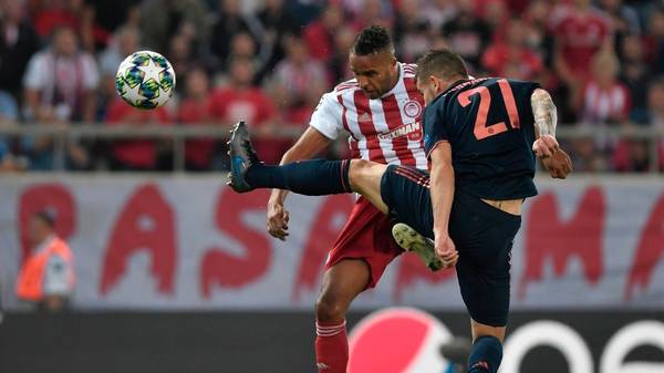 Olympiakos' Moroccan forward Youssef El-Arabi (L) scores a goal during the UEFA Champions League group B football match between Olympiacos FC and FC Bayern Munchen on October 22, 2019 at the Georgios Karaiskakis stadium in Piraeus near Athens, on October 22, 2019. (Photo by LOUISA GOULIAMAKI / AFP) (Photo by LOUISA GOULIAMAKI/AFP via Getty Images)