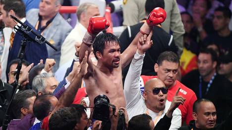 Boxen: Manny Pacquiao gewinnt WBA-Titel gegen Keith Thurman , Manny Pacquiao feiert seinen Sieg gegen Keith Thurman im Weltergewicht